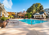 Thumbnail 12 of 32 - Swimming Pool With Relaxing Sundecks at Cedar Springs Apartments, North Carolina