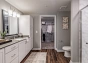 Thumbnail 36 of 86 - Master Bathroom with Vanity and Closet at Edge75, Naples, Florida 34104