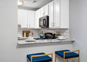 Thumbnail 23 of 64 - Kitchen with Breakfast Bar at Glen at Bogey Hills, St. Charles, 63303
