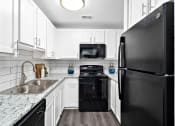 Thumbnail 26 of 64 - White Kitchen Cabinetry at Glen at Bogey Hills, St. Charles, MO