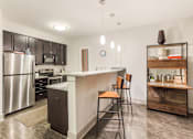 Thumbnail 1 of 21 - Gourmet Kitchen With Island at Heritage at Oakley Square, Cincinnati, Ohio