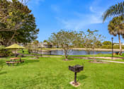 Thumbnail 20 of 24 - BBQ and Picnic Area at Lakeside Glen Apartments, Florida