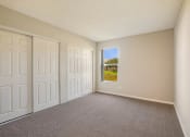 Thumbnail 9 of 24 - Bedroom with Multiple Closets at Lakeside Glen Apartments, Florida