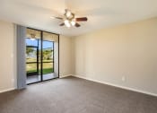 Thumbnail 8 of 24 - Living Room with Ceiling Fan at Lakeside Glen Apartments, Melbourne, 32904