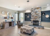Thumbnail 14 of 17 - Clubhouse with Fireplace at The Parkway at Hunters Creek, Orlando, Florida