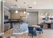 Thumbnail 13 of 17 - Kitchen with Island at The Parkway at Hunters Creek, Orlando, FL