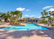 Thumbnail 10 of 17 - Large Outdoor Pool at The Parkway at Hunters Creek, FL 32837