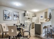 Thumbnail 2 of 22 - Kitchen and Dining Area at Sanford Landing Apartments, Sanford, 32771