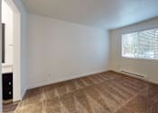 Thumbnail 16 of 41 - Wooden flooring in bedroom at North Creek Apartments, Everett, 98208
