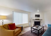 Thumbnail 2 of 41 - Living room with firepit at North Creek Apartments, Washington, 98208