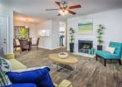 Thumbnail 1 of 23 - Living Room With Dining Area at The Pointe at Irving Park, Greensboro