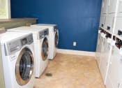 Thumbnail 22 of 23 - Community Laundry Area at The Pointe at Irving Park, Greensboro