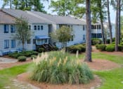 Thumbnail 5 of 24 - Outdoor Greenery at River Crossing Apartments, Thunderbolt, 31404