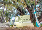 Thumbnail 24 of 24 - Property Entrance Signature at River Crossing Apartments, Thunderbolt, GA, 31404