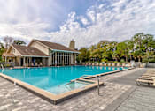 Thumbnail 16 of 22 - Glimmering Pool at Sanford Landing Apartments, Sanford, FL
