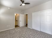 Thumbnail 53 of 105 - Carpeted Bedroom at Sweetwater At Metro North Apartments, Phoenix, AZ