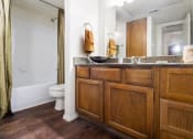 Thumbnail 8 of 16 - Renovated Bathrooms With Quartz Counters at The Glen Apartments, Texas