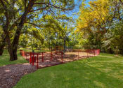 Thumbnail 11 of 16 - Playground at The Glen Apartments, Lewisville, Texas