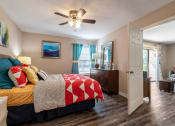 Thumbnail 11 of 17 - Bedroom with Ceiling Fan at Whisper Lake Apartments, Winter Park