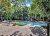Thumbnail 3 of 27 - Poolside Sundeck at The Willows on Rosemeade, Dallas, Texas 75287