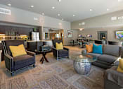 Thumbnail 33 of 37 - Posh Lounge Area In Clubhouse at Woodland Hills Apartments, Colorado, 80918