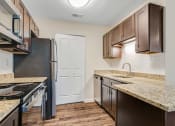 Thumbnail 5 of 64 - Granite Countertop Kitchen at Glen at Bogey Hills, St. Charles, MO, 63303