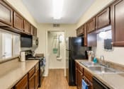 Thumbnail 3 of 16 - Kitchen at The Glen Apartments, Texas, 75067