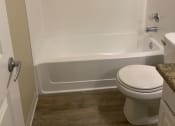 Thumbnail 19 of 31 - Bathroom with a Toilet and a Bathtub at Arcadia Townhomes, Federal Way, WA, 98023