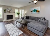 Thumbnail 8 of 37 - living room with fireplace, comfortable setting, and coffee table