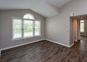Thumbnail 4 of 37 - living room with large windows and modern flooring