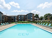 Thumbnail 1 of 24 - A pool with the letters "CCV" in the middle of it.