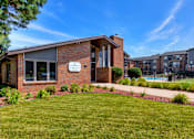 Thumbnail 10 of 13 - marketing office with apartments and pool in background