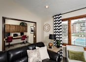 Thumbnail 9 of 13 - couch with business center located in small room behind