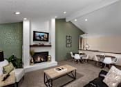 Thumbnail 2 of 13 - community room with tv, coffee table, and tables