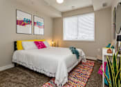 Thumbnail 9 of 27 - a guest bedroom with a large window