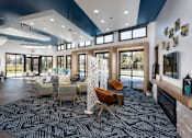 Thumbnail 26 of 37 - interior clubhouse with tall ceiling and windows