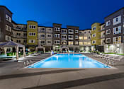Thumbnail 1 of 27 - an exterior shot of the apartment community facing the heated salt-water pool