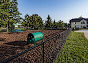 Thumbnail 31 of 37 - private dog park with toys and trees