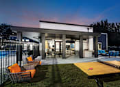 Thumbnail 34 of 37 - the grove with ping pong table, fireplace, and grill