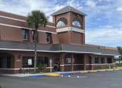 Thumbnail 17 of 18 - a building with a clock tower on top of it at Colonial Apartments, Orlando, 32808
