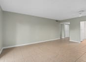 Thumbnail 69 of 74 - Carpeted Living Area at Cypress Grove, Lauderhill, FL, 33313