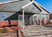 Thumbnail 8 of 39 - the front of a building with a sidewalk in front of it at Emerald Greens, Norman, OK 73072
