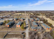 Thumbnail 1 of 39 - a aerial view of a neighborhood of houses and a road at Emerald Greens, Norman, OK 73072