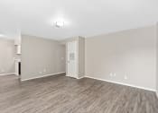 Thumbnail 31 of 39 - an empty room with white walls and a wood floor at Emerald Greens, Norman, 73072