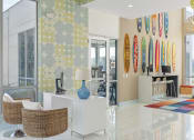 Thumbnail 3 of 17 - a living room with surfboards on the wall at Lakeside Villas, Orlando