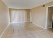 Thumbnail 2 of 15 - Unfurnished Living Area at Hibiscus Place Apartments, Florida, 32808