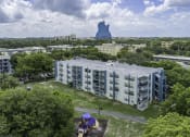 Thumbnail 25 of 54 - an aerial view of a building with a large blue object in the background  at Club at Emerald Waters, Hollywood, FL
