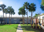 Thumbnail 11 of 15 - Courtyard Green Space at Hibiscus Place Apartments, Orlando, FL