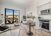 Thumbnail 5 of 27 - A modern kitchen with a view of the city at WM by CLG, Los Angeles California  