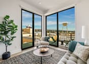 Thumbnail 9 of 27 - A living room with a view of the city at WM by CLG, Los Angeles, CA  